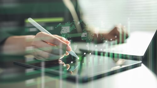 ESG, sustainability, energy, renewable, eco-friendly, environment, A hand is using a digital pen on a tablet with bright ESG charts, symbolizing sustainability analysis and eco-friendly investment.
