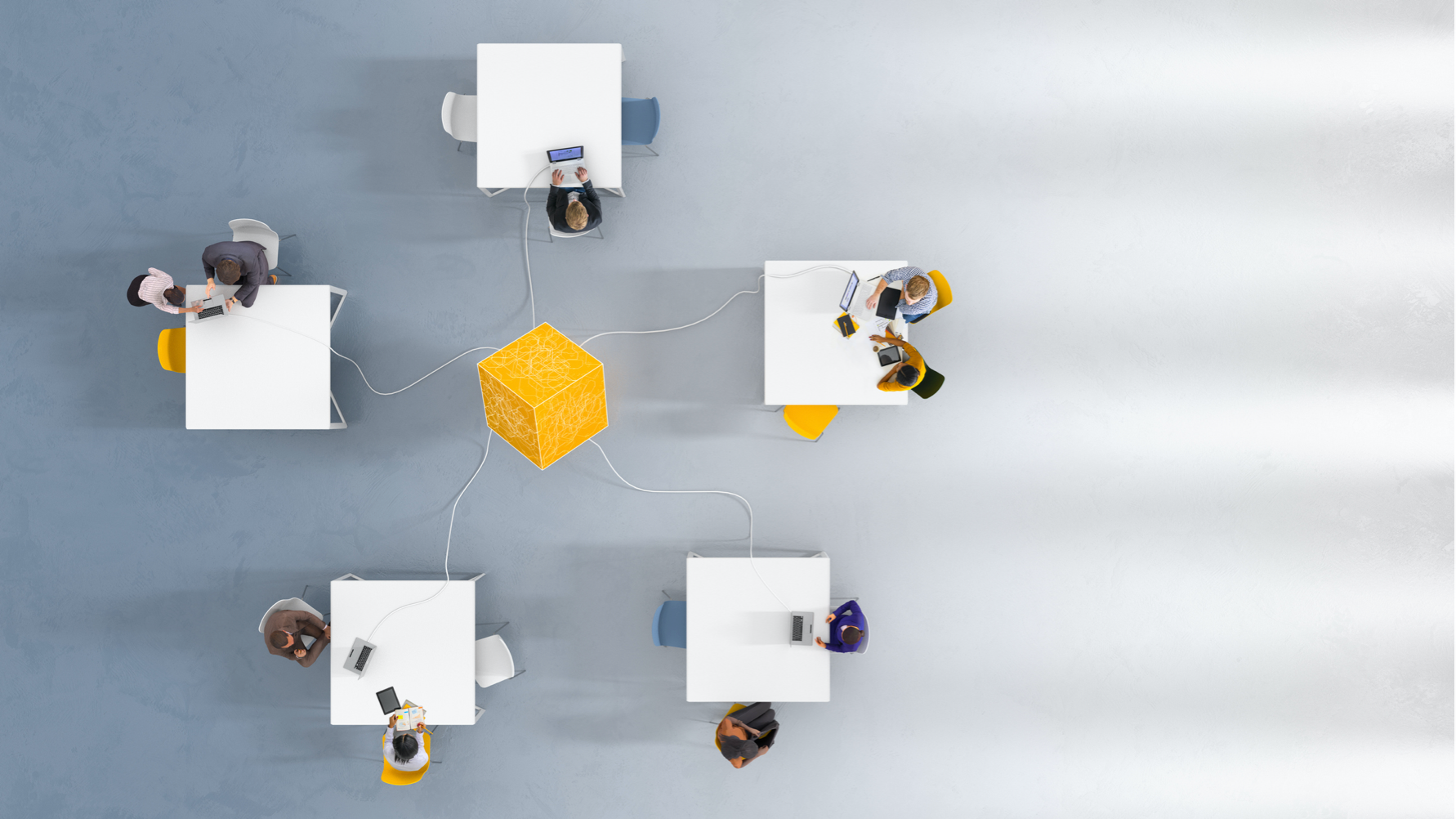 Overhead view of team collaboration – centralized project management and communication.