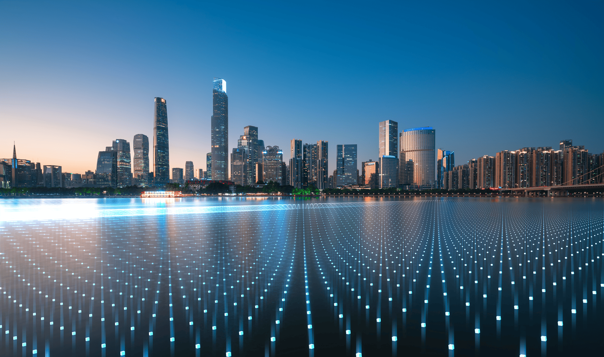 Digital grid overlay on smart city skyline – tech-driven asset connectivity and control.