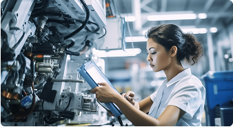 Engineer inspecting factory machinery with a tablet, representing unexpected outages disrupting operations