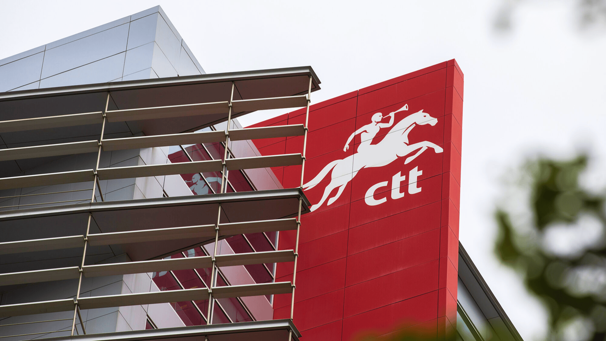 CTT headquarters with red logo and modern architecture – symbol of national logistics operations.